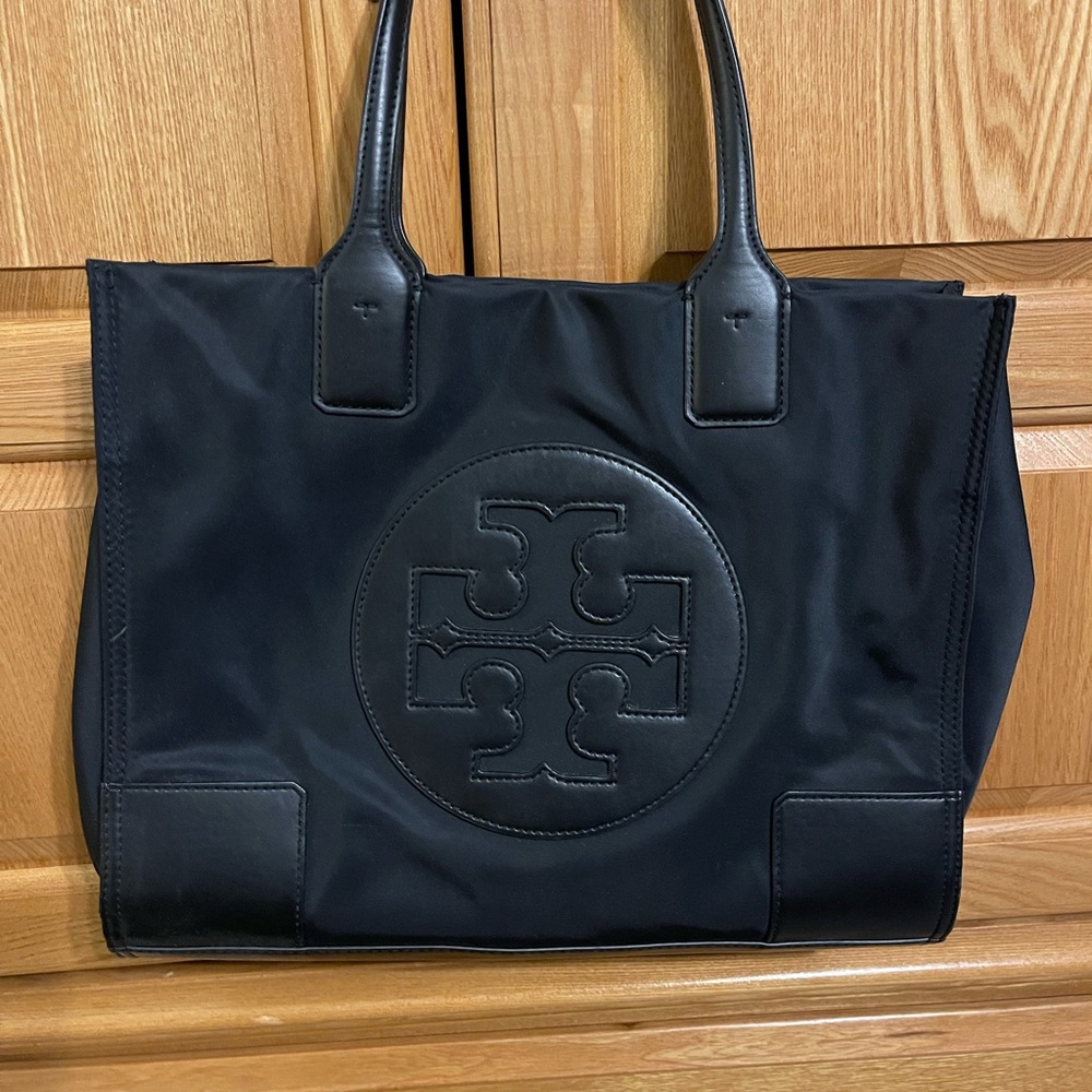 Tory Burch Black Tote Bag with Embossed Logo and Sturdy Handles